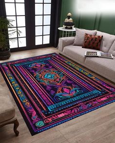 a living room with a couch and rug on the floor