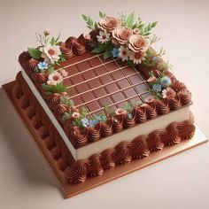 a cake with chocolate frosting and flowers on top