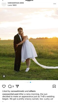 a man and woman are standing in the grass with their arms around each other as they pose for a photo