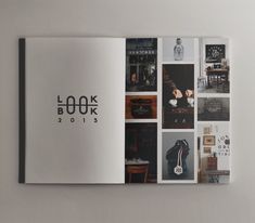 an open book with pictures and words on the cover is shown in black, white, and grey