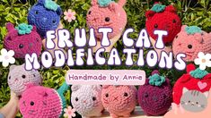 there are many small crocheted animals in front of the sign that says fruit cat modifications