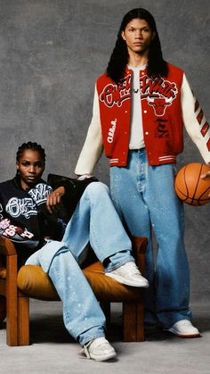 a man sitting on top of a wooden chair next to a person holding a basketball