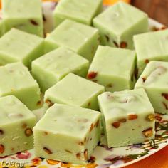 pieces of green fudge cake sitting on a plate