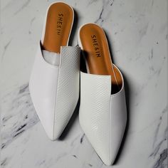 Color: White Size: Eur37 Super Classy! Step Into A World Of Contemporary Elegance With These Mules! These Shoes Redefine Sophistication With Their Striking Design And Sleek Silhouette. The Unique Irregular Detailing Adds An Avant-Garde Touch, Making Each Step A Statement Of Individuality. The Crisp White Hue Effortlessly Complements Any Outfit, From Casual Denim To Chic Dresses. The Point Toe Enhances The Modern Aesthetic, While The Mule Style Offers Easy Slip-On Convenience. Whether You're Atte Zebra Shoes, Denim Mules, Platform Crocs, Crocs Baya, Professional Shoes, Social Event, Heels Classy, Leather Clogs, Birthday Gif