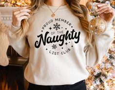 Funny Christmas Sweatshirt, Naughty List Shirt, Sweatshirts for Women, Naughty List Sweatshirts, Women's Christmas Shirts, Christmas Shirts Enjoy our Christmas shirts or our Christmas sweatshirts! They are not only super cute, but extremely soft and comfy! SWEATSHIRT: https://www.etsy.com/listing/871315503/im-stuffed-thanksgiving-pregnancy-shirt -STYLE- **Our adult shirts are the 3001C Bella Canvas Unisex Jersey Tees. If you want a more FITTED look, you might consider ordering a size down. (See Cookies For Two, Christmas Pregnancy Announcement Shirt, Christmas Pregnancy Reveal, Baby Announcement Shirts, Pregnancy Reveal Shirt, Santa Sweatshirt, Womens Christmas Shirts, Sweatshirts For Women, Pregnancy Announcement Shirt