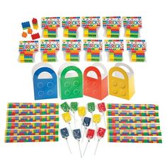 lego blocks party supplies including candy, lollipops and candies