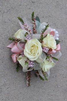 a bridal bouquet with pink and white flowers