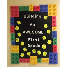 a bulletin board with legos on it that says building an awesome first grade