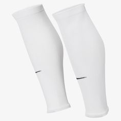 Nike Strike Sleeves Socks These sleeves show off your soccer fandom, while the sweat-wicking technology and stretch fabric will help keep you dry and comfortable on the pitch. Nike Dri-FIT technology moves sweat away from your skin for quicker evaporation, helping you stay dry and comfortable. Stretch design fits comfortably over your shin guard. Shin Guard, Soccer Socks, Shin Guards, Red Nike, Football Kits, The Pitch, Sports Gear, Nike Zoom, Decathlon