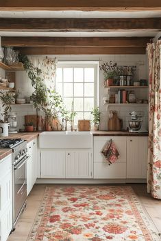 a kitchen with an area rug on the floor