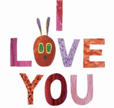 the words i love you are made with colored crayon paper and an apple