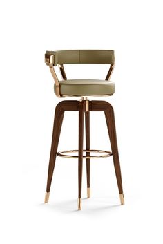 an upholstered bar stool with a beige leather seat and gold metal barstool