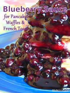 blueberry sauce for pancakes, waffles and french toast is on a plate