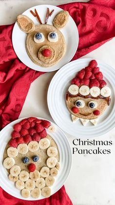 two plates with food on them and one has a reindeer face made out of banana slices