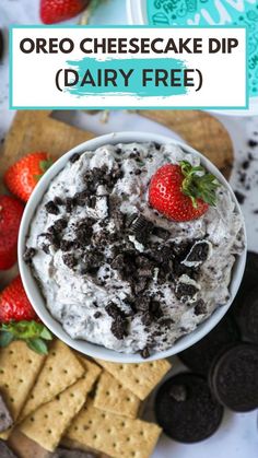 oreo cheesecake dip dairy free in a bowl with strawberries on the side