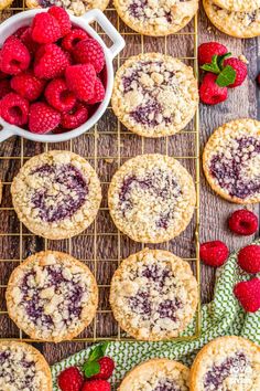 raspberry crumb cookies on a cooling rack with fresh raspberries