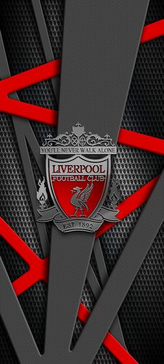 the liverpool football club logo on a black and red background