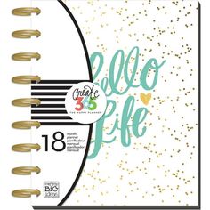 a planner book with gold glitters on it and the words hello life written in white