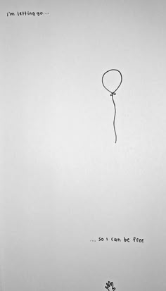 a black and white photo of a balloon floating in the sky with words written on it