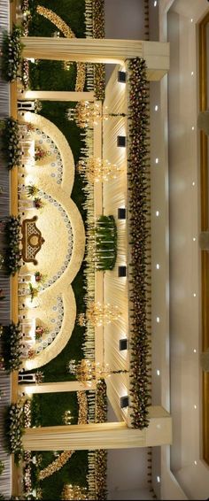 an overhead view of a wedding venue with flowers and greenery in the center area