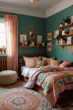 a bedroom decorated in teal and peach colors