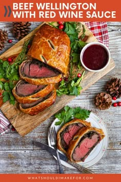 beef wellington with red wine sauce on a cutting board