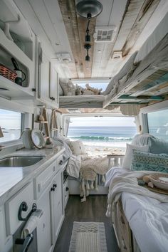 the inside of a camper with an ocean view