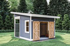 a small shed with the doors open on grass