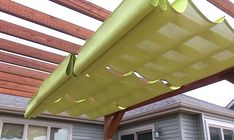 an awning on the outside of a house with wood slats and sidings