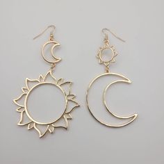 This listing is for a pair of celestial themed earrings or nature themed earrings. 5 variants to choose from! ✨️ Sun + Moon + Star 🌙 Moth Moon Phase 🦇 Bats ☀️ Sun + Moon Gold 💀 Skeletons Elegant Metal Earrings With Sun And Moon Design, Sun And Moon Earrings, Unique Sun And Moon Dangle Earrings, Celestial Sun And Moon Metal Earrings, Brass Sun And Moon Drop Earrings, Spiritual Sun And Moon Dangle Earrings, Earrings Dangle Simple, Sun Moon Stars, Nature Earrings