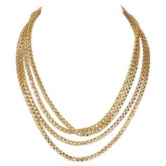 This unusually long (78 inches) handmade necklace can be worn in a variety of lengths. The intricate chain is made of four gold circles around four open circles. It is an endless chain (no clasp) that can be worn looped around two; three or four times. It is 19 karat gold; made in Portugal. Gold Chain Necklace, Handmade Necklace, Handmade Necklaces, Gold Chain, Chains Necklace, Gold Chains, Chain Necklace, Jewelry Necklaces, Chain