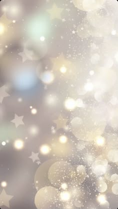 an abstract background with stars and blurry lights