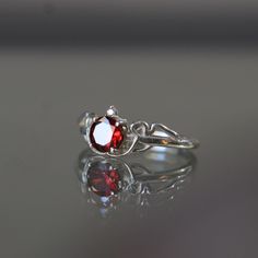 Tree Branches Ruby 925K Sterling Silver Ring, Ring for Fiancee, Tree Silver Ring, Handmade Silver Ring, Moissanite Handmade Ring, Ruby Gift -->Ring details: - Theme: Romantic Wedding & Engagement & Daily - Comfortable Band - Center Stone : Garnet - Moissanite - Garnet - Moissanite Carat: 7mm --->Materials:   - 925 Silver --->The ring size on the model is 4 US. --->Items are shown larger in pictures to show detail - please note the dimensions. This item is in my shop are handcrafted made to order Unique Silver Ruby Ring Gift, Vintage Sterling Silver Ruby Ring As Gift, Handmade Adjustable Silver Ruby Ring, Ornate Silver Ruby Ring, Ornate Ruby Ring In Sterling Silver, Silver Ruby Ring, Gothic Rings, Gold Engraving, Gem Ring