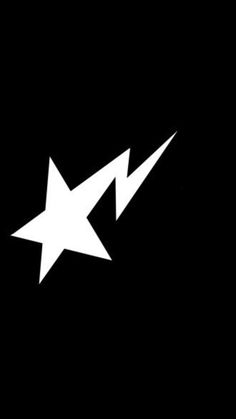 a white star on a black background with an arrow pointing to the right and left