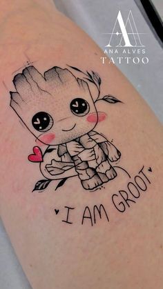 a small baby groote tattoo on the right arm with i am groot in it