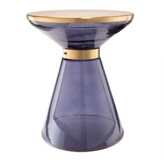 a purple vase with gold trim on the top