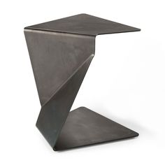 a metal table that has been designed to look like an origami