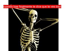 a skeleton is holding his arms in the air