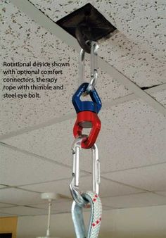 there is a chain hoist hanging from the ceiling in an office building with caption about how to use it