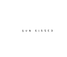 the word sun kissed written in black on a white background