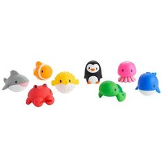 an assortment of small plastic animals on a white background