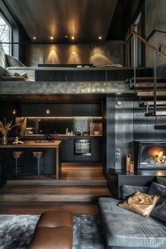 a living room filled with furniture and a fire place in the middle of a kitchen