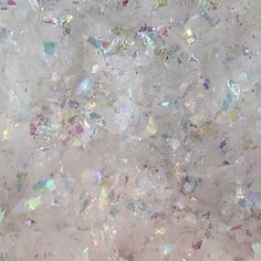 white and multicolored glitter is seen in this image