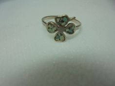 Sterling silver greenish turquoise inlay ring size 4 1/2   very small  preowned very good condition    .sterling silver tarnishes may need cleaning  ,  thanks     please check out pics Green Turquoise 925 Ring For Anniversary, Sterling Silver Green Inlay Rings, Sterling Silver Rings With Green Inlay, Green Sterling Silver Ring With Inlay, Green Inlay Sterling Silver Rings, Clover Ring, Four Leaves, Four Leaf, Leaf Clover