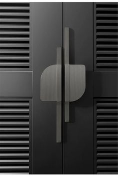 an image of two black doors that are closed