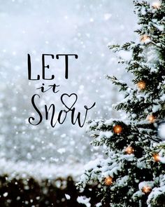 the words let it snow are displayed in front of a snowy background with lights and trees