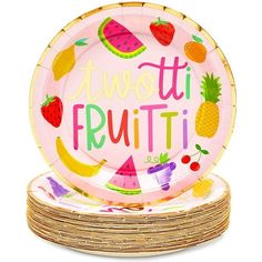 a pink plate with fruit on it and the words, twisti frutiti