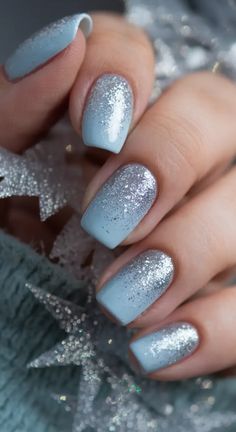 Light Blue With Sparkle Nails, Cute Simple Nails For January, Blue Glitter Gradient Nails, Cute Short New Years Nails, December Nails Blue And Silver, Silver Holiday Nails Christmas, Winter Nails Blue And Silver, January Theme Nails, Easy January Nails