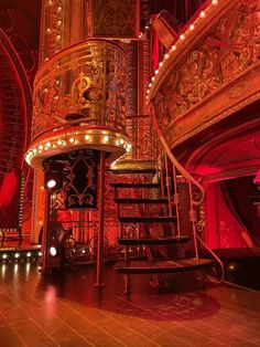 an ornate staircase in the middle of a stage