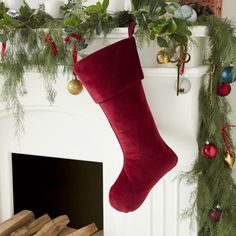 a christmas stocking hanging over a fireplace